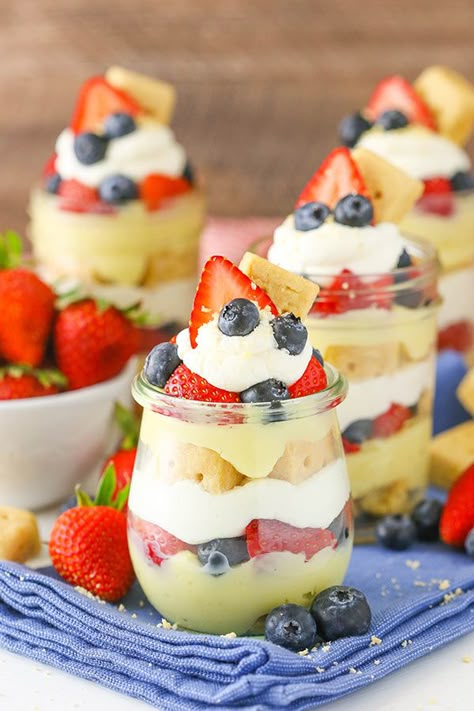 Berry Custard Trifles in a Jar - no bake with layers of Walkers shortbread, custard, whipped cream and fresh fruit! Summer Trifle Recipes, Berry Custard, Summer Trifle, Mother Thyme, Walkers Shortbread, Cheesecake Trifle, Mason Jar Desserts, Berry Parfait, Lemon Mousse