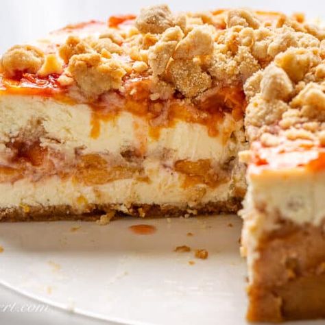 Peach Cobbler Cheesecake - Saving Room for Dessert Peach Crumble Cheesecake, Peach Cobbler Cheesecake Recipe, Peach Cobbler Cheesecake, Chocolate Spritz Cookies, Peach Cupcakes, Peach Cheesecake, Peach Crumble, Sweet Breakfast Treats, Peach Desserts