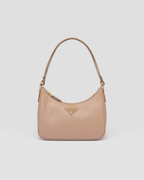 Cameo Beige Prada Re-edition Saffiano Leather Mini Bag | PRADA Unrealistic Dreams, Saffiano Leather Mini Bag, Prada Re Edition, Leather Mini Bag, Beige Purses, Bag Prada, Prada Saffiano, Triangle Logo, Nappa Leather