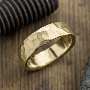 Shop our selection of unique handcrafted men's wedding rings and find the perfect wedding ring for him! Order online. Gold Mens Wedding Ring, Mens Wedding Bands Hammered, Wedding Band Hammered, Gold Mens Wedding Band, Rose Gold Mens Wedding Band, Mens Gold Wedding Band, Wedding Rings Rose Gold, Men's Wedding Ring, Wedding Rings Unique