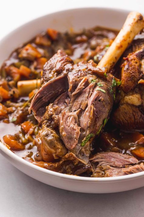 These Instant Pot lamb shanks are braised in a rich deeply flavored red wine until they're fall off the bone tender! They take a fraction of the cooking time compared to oven braised lamb shanks, and are much easier to make in the Instant Pot. #lambshanks #instantpotlambshanks Instapot Lamb Shanks, Persian Lamb Shank Recipe, R3 Recipes, Lamb Shanks Recipe, Shanks Recipe, Lamb Roast Recipe, Cook Lamb, Recipes Instapot, Slow Cooked Lamb Shanks