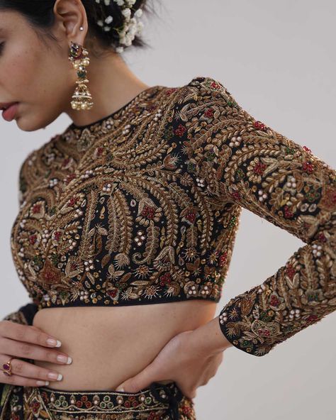 Lost in a world of forbidden luxury. This Noor-e-Mahal Lehenga Set is a masterpiece of intricate gold dabka, Zardozi and Kasab Dori embroidery, designed to tantalize and captivate. Every thread, every bead, is a secret invitation to embrace your inner siren. @_richaahluwalia introduces silhouettes drenched in the sparkles of precious embellishments for the new-age brides. Visit us at B-25, Defence Colony, New Delhi. To schedule an appointment or arrange a video call, please dial +91 8800880... Intricate Embroidery Designs, Secret Invitation, Inner Siren, Thread Work Lehenga, Uniqlo Women Outfit, Casual Bridal Dress, Embroidery Lehenga, Dori Embroidery, Velvet Lehenga