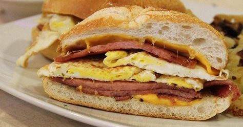 The pork roll is New Jersey's answer to the perfect breakfast sandwich to kick off the day. Whether you call it pork roll or Taylor Ham, New Jerseyans are unanimous in their love for this sandwich. Taylor Pork Roll, Taylor Ham, Rolled Sandwiches, Pork Roll, Delicious Sandwiches, Work Lunch, Easy Casserole Recipes, Entree Recipes, Easy Casserole