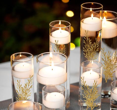 Candle Water Centerpiece, Water Centerpieces, Silver Tablecloth, Silver Charger Plates, Christmas Dining Table Decor, Clear Glass Candle Holders, Floating Candle Centerpieces, Candle Arrangements, Water Candle