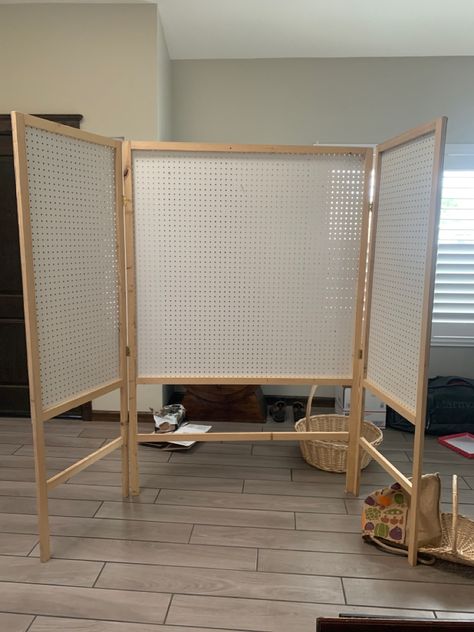 My husband made this over the course of a few days. We found similar plans onlone and went from there! Pegboard Retail Display Ideas, Quilt Booth Display Ideas, Checkout Stand For Craft Show, Indoor Craft Booth Displays, Cute Vendor Booth Ideas, Diy Market Stand, Market Backdrop, Booth Display Ideas Diy, Art Fair Booth