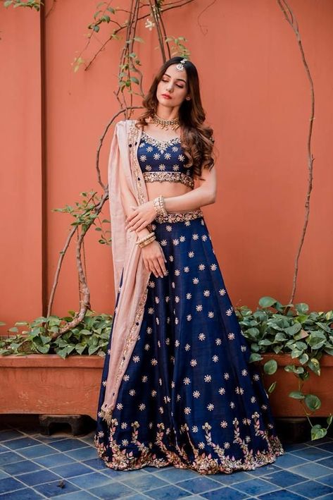 Wearing a blue bridal lehenga for your big day? These blue bridal lehengas will up your glamour quotient. The unique lehenga is in huge demand nowadays. Take cues from these designer lehenga. #blue #bluelehenga #bluecoloredoutfits #bluedresses #bridalehenga #bluebridallehenga #indianbrides #indianwear #bridalwear #Lehengadesigns #lehengainspiration Lehenga Simple, Royal Blue Lehenga, Indian Wedding Gowns, Indian Outfits Lehenga, Lehnga Dress, Work Lehenga, Blue Lehenga, Pink Lehenga, Indian Bridal Wear