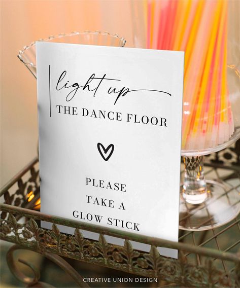 5x7 and 8x10 Printable Light Up The Dance Floor, Please Take A Glow Stick Sign *Please note: The files are non-editable * * * * * MATCHING ITEMS * * * * * Build Your Own Bundle and save 60% when you purchase 5 or more items! Go to our shop home page and search: Minimal Aesthetic Or simply click here: https://www.etsy.com/shop/creativeuniondesign/?etsrc=sdt&search_query=Minimal+Aesthetic * * * * * HOW IT WORKS * * * * *  1. Download the PDF (or JPG) 2. Print on standard 8.5x11 white paper (print at 100%) 3. Trim white edges & frame! * * * * * FILES INCLUDED* * * * *  - 5" x 7" JPG - 5" x 7" PDF with crop marks - 8" x 10" JPG - 8" x 10" PDF with crop marks * * * * * PRINTING OPTIONS * * * * * For professional printing, I recommend Prints of Love.  They offer high-quality prints and amazing c Light Up Glow Sticks Wedding, Wedding Decor Minimal, Light Up The Dance Floor, Decor Minimal, Glow Stick, Wedding Stationery Design, Aesthetic Minimalist, Printable Stationery, Cute Wedding Ideas