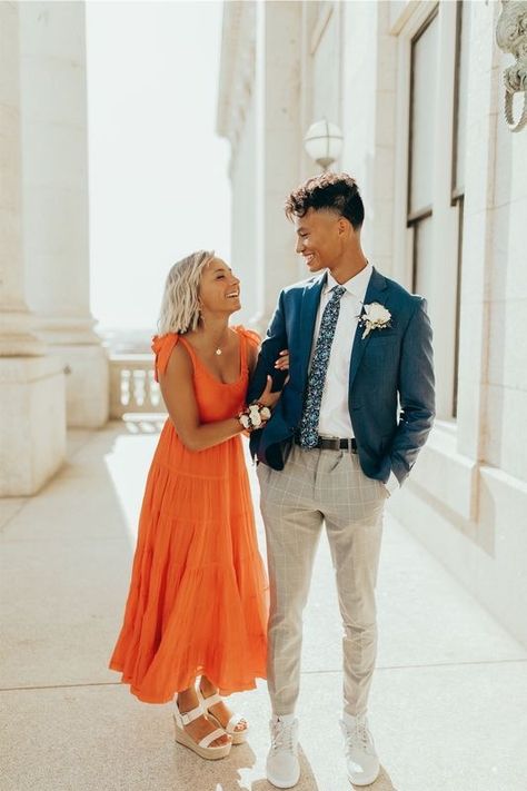 Spring Wedding Guest Couple Outfit, Orange Dress Couple Outfit, Hoco Photography Poses, Matching Couple Wedding Guest Outfits, Couple Formal Outfits Classy, Hoco Boys Outfits, Hoco Couple Outfits, Couple Prom Pictures, Mormon Prom