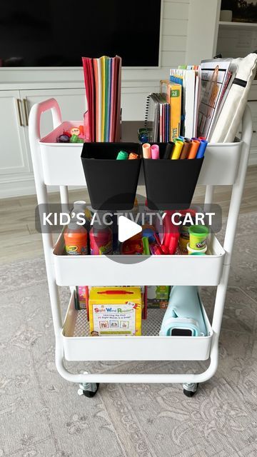 Amy Adler | Coffee and Denim on Instagram: "Kid’s activity cart ✨ Comment LINK to get products shown here directly to your inbox!⁣ ⁣ I love using utility carts for all different purposes. This time the cart was a great way to store a lot of my kid’s activities we use for rainy/sick days or just when we want something fun to do at-home. It also has wheels so you can take it from one room to another! ⁣ ⁣ #toddleractivity #toddleractivitiesathome #kidsactivities #toddlerartsandcrafts #kidsactivityideas #artcart" Art Cart Organization For Kids, Kids Art Cart, Craft Cart, Kids Stationary, Toddler Arts And Crafts, Wheel Art, Art Cart, Kids Art Supplies, Summer Learning