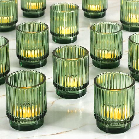 PRICES MAY VARY. Elegant Ribbed Green Glass Votive Candle Holders - Set of 12 - Enhance your home decor with the stunning Ribbed Amber Glass Votive Candle Holders. Each holder features a sophisticated ribbed design, creating a beautiful interplay of light and shadow. Perfectly packaged in a set of 12, these vintage-inspired tea light holders are securely wrapped in bubble wrap and shipped in a sturdy brown box, ensuring they arrive in perfect condition Versatile Home Decor - Ideal for any occasi Wedding Table Decorations Natural, Green And White Wedding Color Scheme, Ribbed Candle Holder, May Wedding Table Decorations, Candle Alternatives Wedding, Winter Reception Decorations, Neutral Engagement Party Decor, Wedding Table Votives, Simple Wedding Shower Decorations