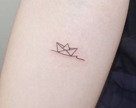 Paper Ship Tattoo, Sailboat Tattoo Simple, Paper Boat Tattoo, Tattoo Easy, Sailboat Tattoo, Boat Tattoo, Origami Tattoo, Airplane Tattoos, Circle Tattoos