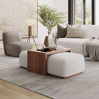 Elevate your living space with the Bennington Sliding Ottoman. Crafted with plush ivory boucle fabric and a sleek wood base, this 48" ottoman exudes modern luxury. Its deep cushioning invites you to sink in, offering both comfort and style. What sets it apart? Caster wheels ensure effortless mobility, allowing you to adapt your space with ease. But here's the ingenious twist: included is a 30" wooden coffee table top that effortlessly slides over, transforming it into a chic coffee table. This v Table Top Wood, Coffee Table Top, Chic Coffee Table, Inspire Me Home Decor, Ottoman Coffee Table, Ottoman Table, Wooden Coffee Table, Living Room Coffee Table, Coffee Table With Storage