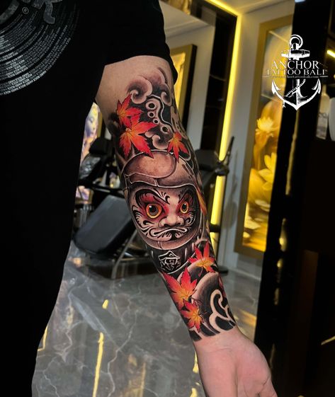 DARUMA HALF SLEEVE TATTOO DONE BY MR RICO🔥 Road To Anniversary Anchor Tattoo Bali 2023 Get special prices for every tattoo you booked! BOOK NOW! DM us for booking or walk-in, our artists are available for a FREE CONSULTATION to collaborate on your idea 💡 ✨WALK IN AVAILABLE EVERY DAY 9 AM - 10 PM Anchor Tattoo Bali Legian Street, No. 141, Kuta. #AnchorTattooBali #InkYourStory #QualityIsOurConcern #tattoo #tattoolover #tattooartist #inked #inkedmag #inkedmagazine #art Daruma Doll Sleeve Tattoo, Orientalism Art Tattoo Half Sleeve, Japanese Daruma Tattoo Design, Japanese Half Sleeve Tattoo Design, Daruma Doll Tattoo Design, Japan Tattoo Ideas, Daruma Tattoo Design, Tattoo Daruma, Japanese Forearm Tattoo