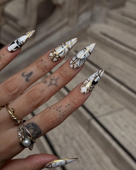 this set said: ⛅️🏰🌛⛰️ || by @nailphases . . . . . inspired by @icarus_tattoo tattoo nails, cathedral nails, nail art, gel x, atx nails, atx nail tech, rose hand tattoo, dark academia nails, alt nails, gold goth, ring stack Nail Artist Tattoo, Nail Tech Tattoo, Cathedral Nails, Academia Nails, Dark Academia Nails, Alt Nails, Gold Goth, Icarus Tattoo, Tech Tattoo