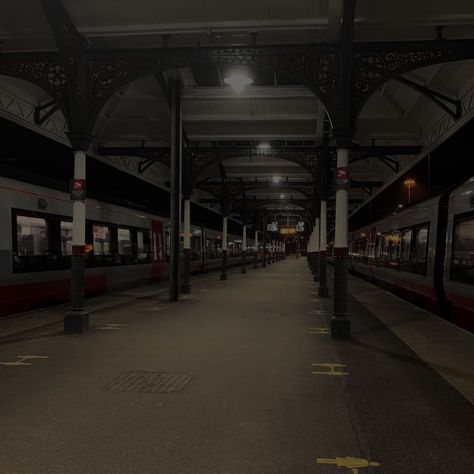 train station at night, low light looking down platform with trains on either side London Train Station Aesthetic, Abandoned Train Station Aesthetic, Time Travel Aesthetic Dark, Dark Train Station, Train Station Underground, Grunge City Aesthetic, Train Station Design, Grunge Photography Aesthetic, Train Station Aesthetic