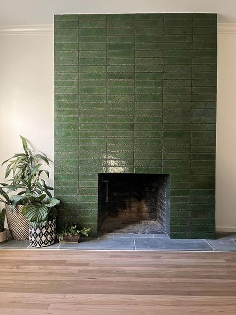 Our Old House | Just a little Before and After on the fireplace in our 1947 Split | Facebook Mid Century Tiled Fireplace, Early 2000s Fireplace Makeover, Cover Up Brick Fireplace, Green Brick Fireplace, Modern Tiled Fireplace, Tiled Chimney, Statement Fireplace, Mid Century Modern Fireplace, Mid Century Fireplace