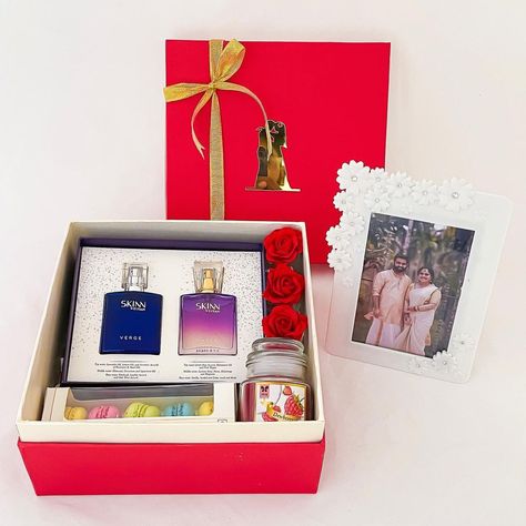 Angroos on Instagram: “Special customised gifts hamper for couples CODE GB-4883 . . . #weddinggift #forcouples #gifts #giftsforher #giftsforhim…” Titan Perfume, Wedding Anniversary Gifts For Parents, 25th Wedding Anniversary Gifts, Wedding Gift For Friend, Couple Indian, Gifts Hamper, 25 Wedding Anniversary Gifts, Artificial Flowers Decor, Gifts For Parents