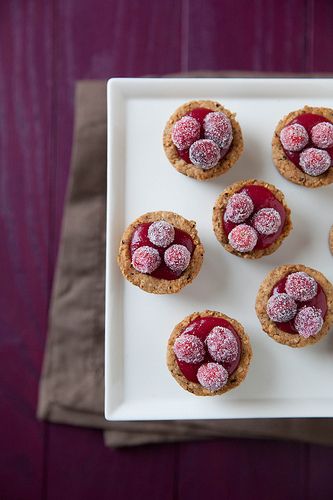 Last year at about this time, I learned 1) just how easy it was to make sugared cranberries, 2) that they are essentially edible holiday decorations, and 3) they are addictively sweet-tart and I love them. While cranberries are widely available, I find myself coming up with more and more reasons to use sugared cranberries. … Cranberry Dessert Recipes, Cranberry Tartlets, Cranberry Recipes Dessert, Curd Tarts, Cranberry Curd, Food Photography Cake, Unique Sweets, Quick And Easy Sweet Treats, Cranberry Tart