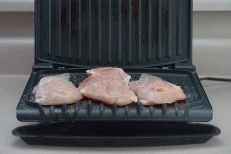 How to Cook Chicken on a George Foreman Grill | eHow Chicken George Foreman Grill, Cook Chicken From Frozen, Chicken From Frozen, George Foreman Recipes, George Foreman Grill, Leg Quarters, Chicken Leg Quarters, Easy Grilling, George Foreman