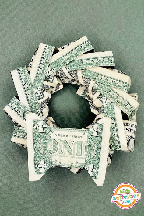 Fun Tutorial for Dollar Bill Origami Christmas Wreath | Kids Activities Blog Oragami Money, Origami Christmas Wreath, Money Origami Tutorial, Origami Wreath, Origami Easy Step By Step, Origami Tutorial Easy, Dollar Origami, Dollar Bill Origami, Creative Money Gifts