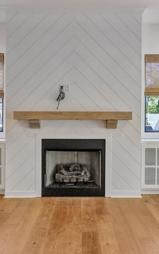 Shiplap Fireplace Herringbone, Angled Shiplap Fireplace, Diagonal Shiplap Fireplace, Chevron Wood Fireplace Wall, Shiplap Wall Behind Fireplace, Tile Fireplace With Built Ins, Chevron Shiplap Fireplace Wall, Shiplap And Tile Fireplace Wall, Herringbone Shiplap Fireplace Wall