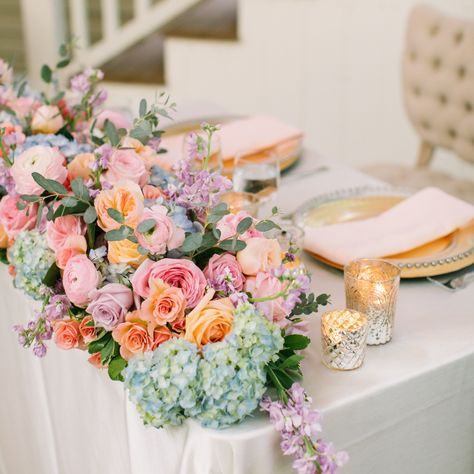 Enchanted Florist’s Instagram post: “Pete and Sarah's bright watercolor wedding was an absolute dream! Their bright watercolor florals were a unique mix of soft shades, ranging…” Colorful Pastel Wedding, Wedding Flowers Colorful, Main Table Wedding, Spring Wedding Reception, Sweetheart Table Flowers, Colorful Spring Wedding, Bride Groom Table, Enchanted Florist, Pastel Wedding Flowers