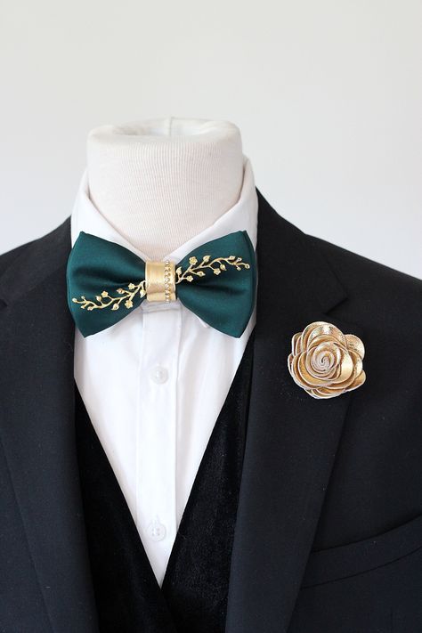 Emerald green satin mens tuxedo bow tie, emerald green bowties men, gold boutonniere lapel flower teal wedding, groom gift set, groomsmen by Nevestica on Etsy Emerald And Gold Wedding Party, Emerald Green Dress Gold Accessories, Emerald Green And Gold Wedding Dress, Wedding Suit Green Tie, Emerald And Gold Tuxedo, Teal Green And Gold Wedding, Emerald Green And Gold Suit Men, Emerald Green Wedding Theme Groomsmen, Emerald Green Navy Blue And Gold Wedding