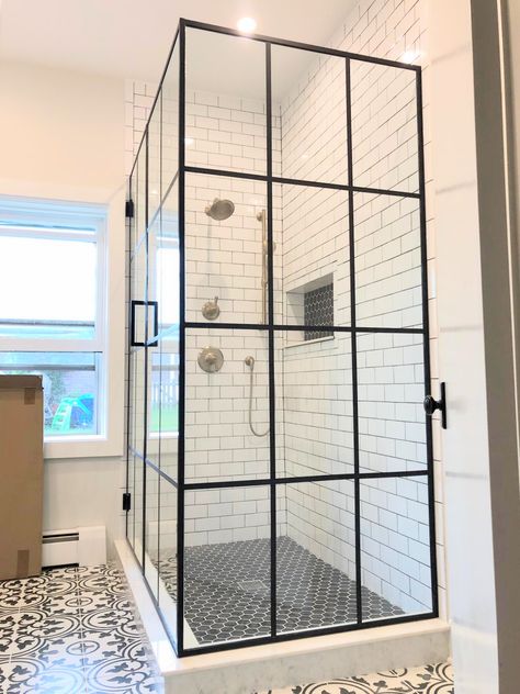 Custom black framed grid design shower doors by Ultimate Glass Art, Inc in Chicago. We custom fabricate and design black framed shower glass. Shower Cabin Black Frame, Black Trim Shower Enclosure, Black Panel Shower Door, Black Frame Shower Enclosure, Black Pane Shower Doors, Shower Glass Black Frame, Large Shower Glass Door Ideas, Black Glass Shower Enclosure, Glass Shower Door With Black Hardware