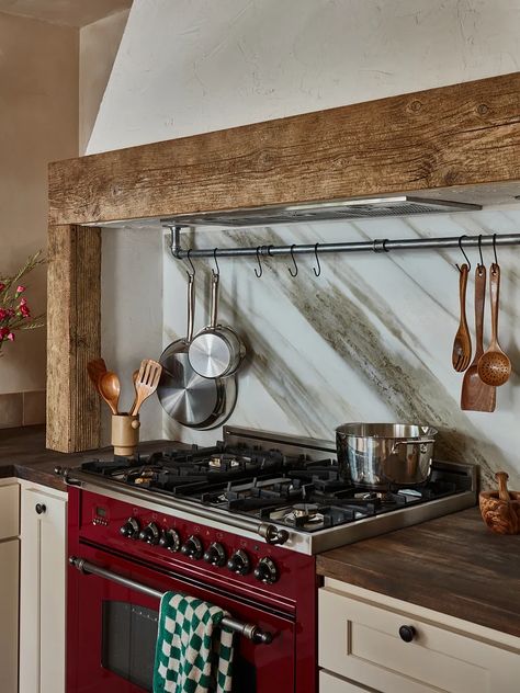 Red range in kitchen with wood hood accents Tuscan Cottage, Cobblestone Patio, Amish Barns, Tuscan Kitchen, Tuscan Inspired, Marble Backsplash, Old Cottage, Tuscan Style, Bunk House