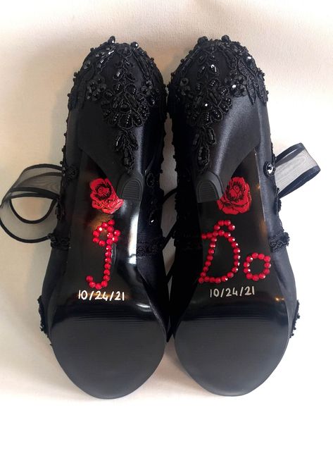 Moody brides need these black bridal shoes to compliment their dark wedding! "I Do" and red roses added on the soles with the wedding date, as a personal touch. Unique yet elegant, you can't go wrong with these black lace embellished wedding shoes... Comfortable low heels available. #comfortableshoes #lowheels #moodywedding #blackwedding #blackshoes #IDo #personalizedshoes #laceshoes Black Wedding Shoes Bride Heels, Black Wedding Shoes Bride, Black Bridesmaid Shoes, Black Wedding Shoes, Embellished Wedding Shoes, Custom Heels, Bride Heels, Black Lace Wedding, Dark Wedding Theme