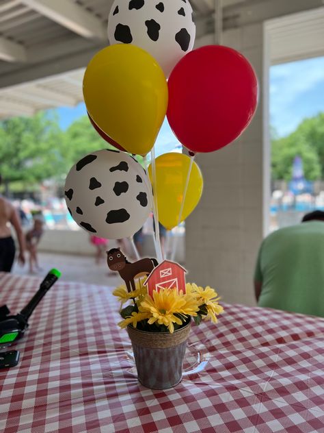 Pail and fake flowers from DollarTree, balloon stand sold as set of 4 on amazon Farm Animal Balloon Centerpieces, Mickey Mouse Farm Centerpieces, Farm Party Centerpieces, Farm Centerpieces Birthday, Farm Party Centerpiece Ideas, Barnyard Birthday Party Boys, Farm Theme Centerpieces, Farm Baby Shower Theme, Centerpiece Balloon