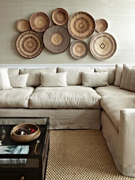 12 Ways to Decorate Above Your Sofa | One Thing Three Ways | HGTV Plates On The Wall, Basket Walls, Decoration Hall, Basket Wall Decor, Inspire Me Home Decor, Family Room Design, Boho Living, Inspired Living, Boho Living Room