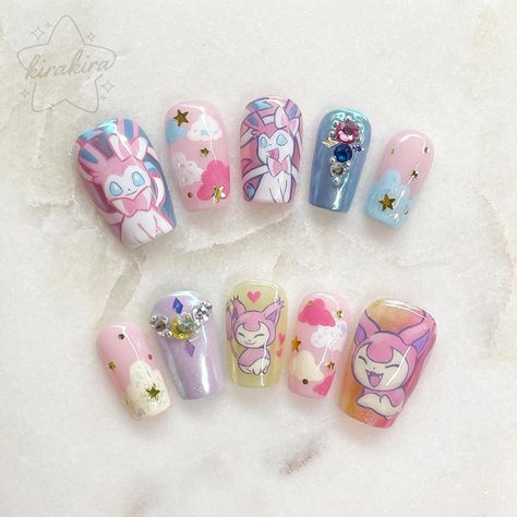 All Posts • Instagram Sylveon Nails, Skitty Pokemon, Video Game Nails, X Nails Design, Movie Nail Art, Judy Doll, Game Nail Art, Game Nails, Pokemon Nails