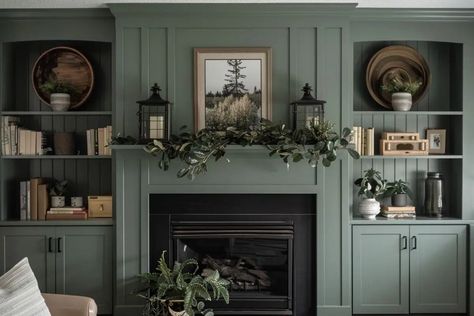 Discover 50+ inspiring ideas for stunning fireplace built-ins. Elevate your space with these tips on decor, color palettes, and designs. Custom Shelving Around Fireplace, Blue Fireplace Wall Living Room, Wall And Fireplace Same Colour, Green Tv Built In, Green Fireplace And Built Ins, Green Fireplace Living Room, Dark Mantle Decor, Coloured Fireplace Surround, Family Room With Built Ins