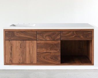 brian damico on Etsy Floating Wood Vanity, Concrete Vanity Top, Walnut Vanity, Concrete Vanity, Reclaimed Wood Console Table, Hidden Cabinet, Floating Bathroom Vanities, Wood Bathroom Vanity, Modern Style Furniture