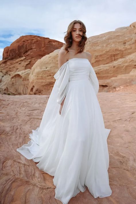 Non Traditional White Wedding Dress, Wedding Dress Long Flowy Sleeves, Twirly Wedding Dress, Long Sleeve Wedding Dress Unique, Wedding Dress With Drape Sleeves, Fitted Flowy Wedding Dress, Wedding Dresses For Mid Size Women, Structured Top Wedding Dress, Wedding Dresses Applique