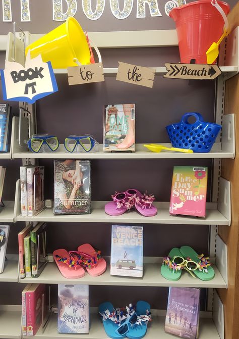 Book It to the Beach Library Display Books Library, Summer Book Display, May Book Displays, Summer Library Display Ideas, Library Book Displays Bookshelves, June Library Display Ideas, Summer Library Displays, Ocean Themed Library Display, Library Summer Display