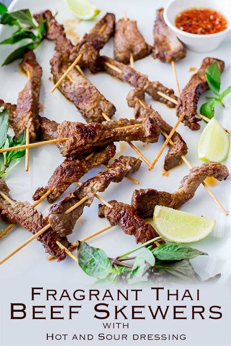 Tender Thai beef, cooked on the grill until smoky, juicy and pack with flavor. A great way to make Thai street food at home. The Thai marinade makes the steak a little sweet and a little spicy, perfect for the outdoor grill. These Thai Beef Skewers with Hot & Sour Dressing are a great summer recipe. Recipe by Sprinkles and Sprouts | Delicious Food for Easy Entertaining #beefskewers #beefkebabs #steakkebabs #steakskewers #thaibeef #grilling Luau Food Ideas, Luau Party Food, Beef Satay, Steak Kebabs, Luau Food, Beef Kebabs, Thai Beef, Thai Foods, Beef Kabobs