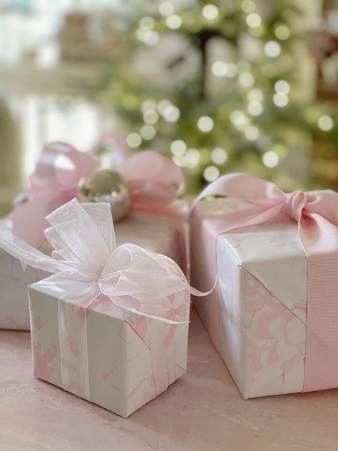 Today I am sharing how to wrap a gift with homemade wrapping paper and bows. I also decided to try a new color palette because I love pink! I have a confession to make. I use to wrap all of my gifts on Christmas Eve. I think I was so busy with baking for our … Professional Gift Ideas, Creative Corporate Gifts, 100 Year Old Home, Gifts For Clients, Holiday Gift Tags Printable, Wrap A Gift, Gift Wrapping Station, Pink Christmas Ornaments, Colorful Gift Wrapping