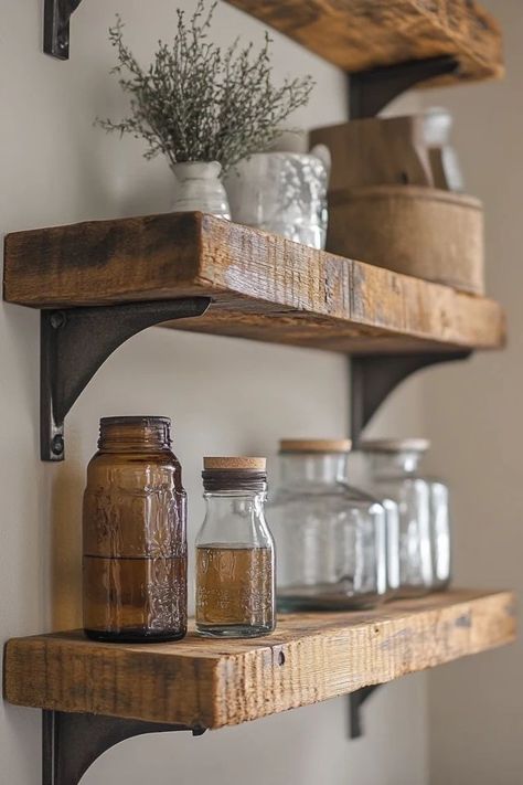 "Add depth and texture to any room with DIY Reclaimed Wood Shelves! 🛠️🪵 These shelves are a perfect blend of practicality and rustic elegance. 🌿✨ #WoodCrafting #DIYDecor #SustainableHome" Thick Wood Shelves, Rustic Wood Shelf, Barn Wood Shelves, Raw Wood Shelves, Live Edge Kitchen Shelves, Wooden Kitchen Shelves, Kitchen Wood Shelves, Rustic Wooden Kitchen Shelves, Reclaimed Wood Shelf