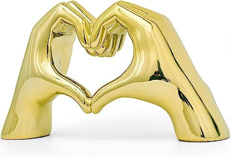 Taylor Swift Gesture statue is a perfect home decoration, you will love this heart gesture statue, they are well made, sturdy, beautiful and present the beauty of modern art. This gold decor statues are very suitable for room decor, kitchen decor, bedroom decor, office decor, living room decor, hotel decor, apartment decor. The abstract art modern gold decor is made of resin materials as a whole, the surface is smooth and comfortable to touch and easy to clean, no peculiar smell, non-toxic and Coffee Table Centerpiece, Bedroom Shelf, Shelf Coffee Table, Modern Statue, Hand Statue, Decorations For Living Room, Bookshelves In Bedroom, Apartment Decorating Living, Modern Art Sculpture