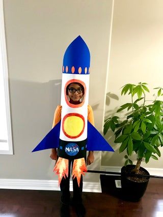 Handmade Rocket Ship Costume : 6 Steps (with Pictures) - Instructables Rocket Ship Costume, Diy Fancy Dress Costumes, Cardboard Rocket Ship, Rocket Costume, Vampire Costume Diy, Cardboard Rocket, Fancy Dress Costumes Kids, Pirate Costume Diy, Fancy Dress Competition