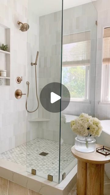 Bedrosians Tile on Instagram: "From outdated and drab to bright and airy, this new white bathroom with herringbone wood floors and a sleek white tiled shower is a total showstopper. It just goes to show what a little bit of love and a lot of design can do!  Flooring: Othello 8x48 in Oak Shower Tile: Cloe 2.5x8 in White  Designed by @roomeyandco" Cloe Shower Tile, Herringbone Bathroom Floor, Herringbone Bathroom, Bedrosians Tile, Herringbone Wood Floor, Herringbone Wood, Tiled Shower, Master Bath Remodel, White Shower