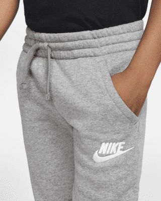 Kick back in the Nike Sportswear Club Fleece Pants. Supersoft, brushed fleece fabric has a jogger-inspired look with an elastic waistband for all-day comfort. Shown: Carbon Heather/Cool Grey/White Style: CI2911-091 Nike Sportswear Club Fleece, Kick Backs, Fleece Pants, Kids Pants, White Style, Nike Sportswear, Christmas List, Fleece Fabric, Big Kids