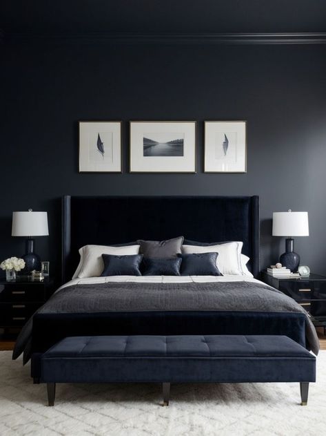 Create a captivating focal point in your bedroom with a dark moody accent wall using rich, deep colors like navy blue or charcoal grey. Complement the wall with modern furniture pieces, such as a sleek platform bed or a velvet-upholstered armchair, to add a touch of elegance and sophistication to the space. Dark Moody Accent Wall, Moody Accent Wall, Dark And Cozy Bedroom, Dark Modern Bedroom, Accent Furniture Bedroom, Dark And Cozy, Navy Bedrooms, Navy Blue Bedrooms, Grey Accent Wall