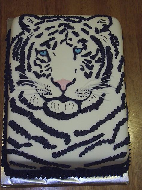 White Tiger White tiger cake covered in fondant, black stripes done in butter cream. Tiger Cakes, Picture Cake, Tiger Party, Tiger Cake, Tiger White, Tiger Birthday, Cake Writing, Safari Cakes, Elephant Party