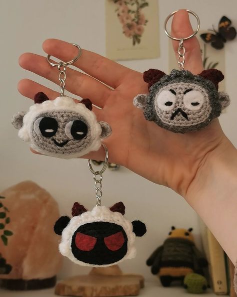 Lamby and Goat-y? 🐐❤️🐑 What are we calling this new guy? Name aside, I love them so much!! I made these for me and my Player 2 🎮💕 @cultofthelambofficial Pattern? They are so quick to make, but the felt faces may be the end of me 💀 #crochet #amigurumi #amigurumilove #fiberart #crochetcommunity #cultofthelamb #cultofthelambfanart Crochet Cult Of The Lamb, Cult Of The Lamb Crochet, Cult Of The Lamb Goat, Skeleton Crochet Pattern, Goblin Crochet, Gay Crochet, Goat Crochet, Skeleton Crochet, Felt Faces