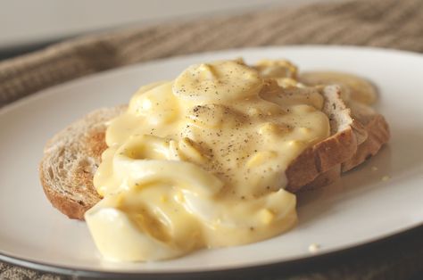 Creamed Eggs on Toast  (we use American cheese slices instead of velveeta cubes) I prefer my creamed eggs on toasted country white bread. Creamed Eggs On Toast, Egg Gravy, Eggs On Toast, Perfect Hard Boiled Eggs, Grandma's Kitchen, Grandmas Kitchen, How To Cook Asparagus, Egg Toast, Creamed Eggs