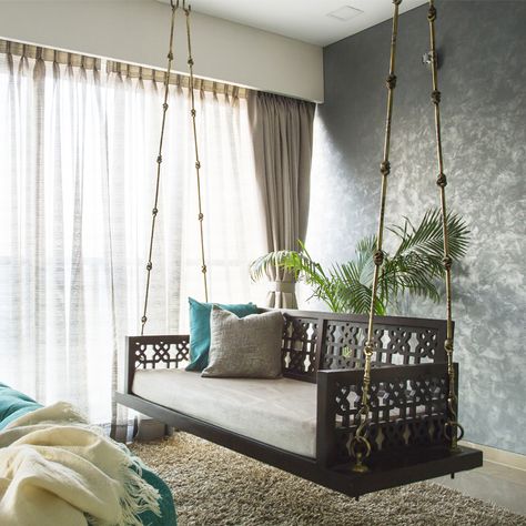 The swing in the living comes as an icing on the cake at Charudatta's home. #IndianHomes #HomeInteriors #InteriorDesign House Interior Indian, Room Swing, Indian Room Decor, Swing Bed, Indian Living Rooms, India Home Decor, Indian Interiors, Indian Home Interior, Ethnic Home Decor