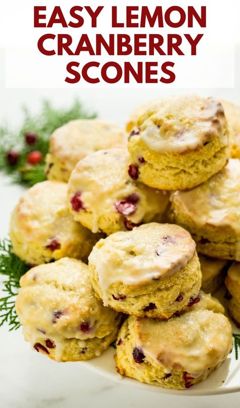 46 minutes · Vegetarian · Serves 18 · You'll love these easy homemade cranberry lemon scones made with fresh meyer lemons and cranberries. It's an easy make ahead breakfast treat that's perfect for weekend breakfast or brunch and holidays like Christmas, New Years and Easter. These buttery sweet biscuits are light and flaky with a sweet tart lemon glaze and sparkling sugar topping. #lemonscones #cranberryscones Cranberry Lemon Scones, Classic Scones Recipe, Easy Make Ahead Breakfast, Lemon Cranberry, Sweet Biscuits, Cranberry Orange Scones, Cranberry Scones, Lemon Scones, Scones Easy